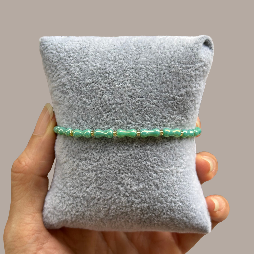 Sea Glass Shimmer Strand – Iridescent Green Hourglass Bead Stretch Bracelet⁠