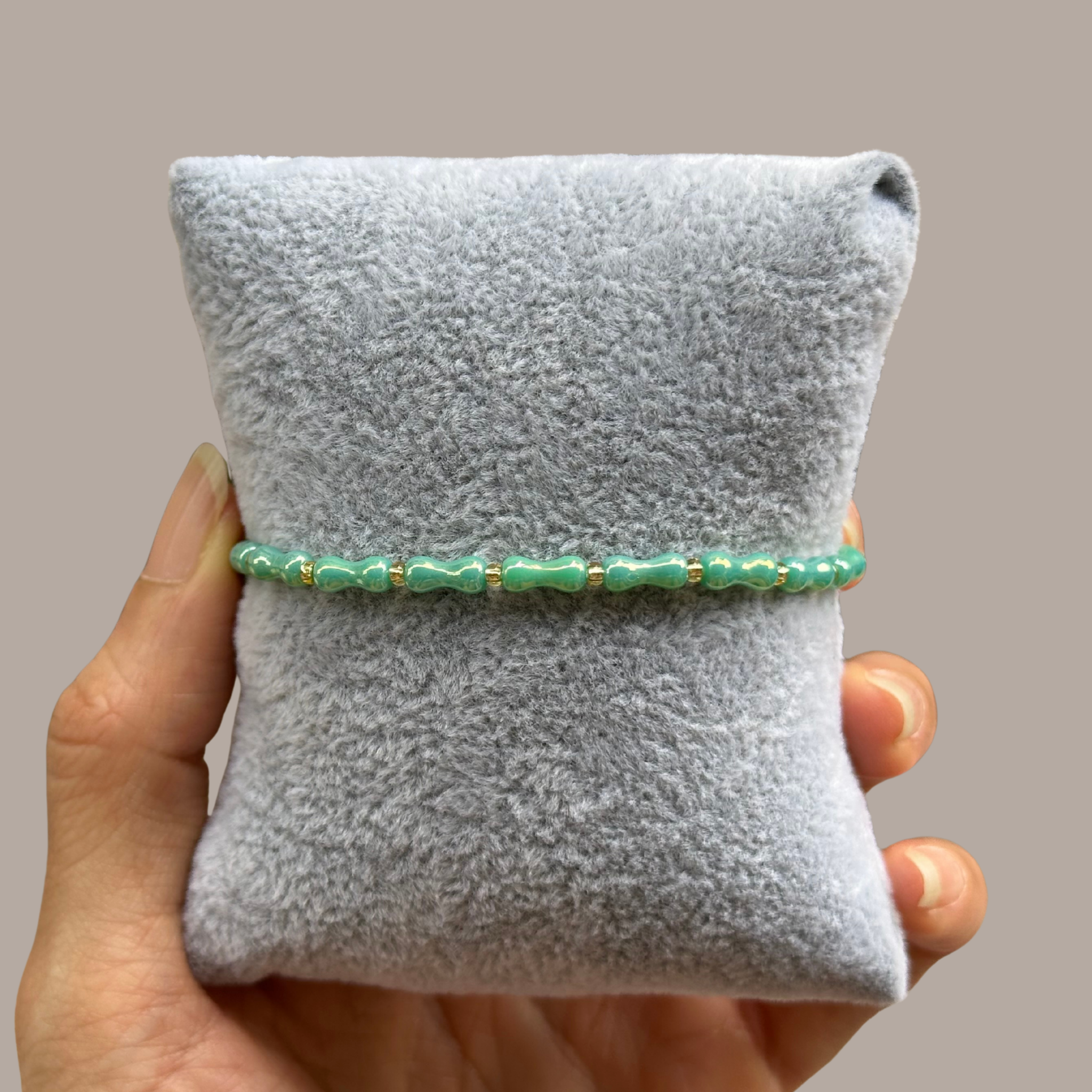 Sea Glass Shimmer Strand – Iridescent Green Hourglass Bead Stretch Bracelet⁠