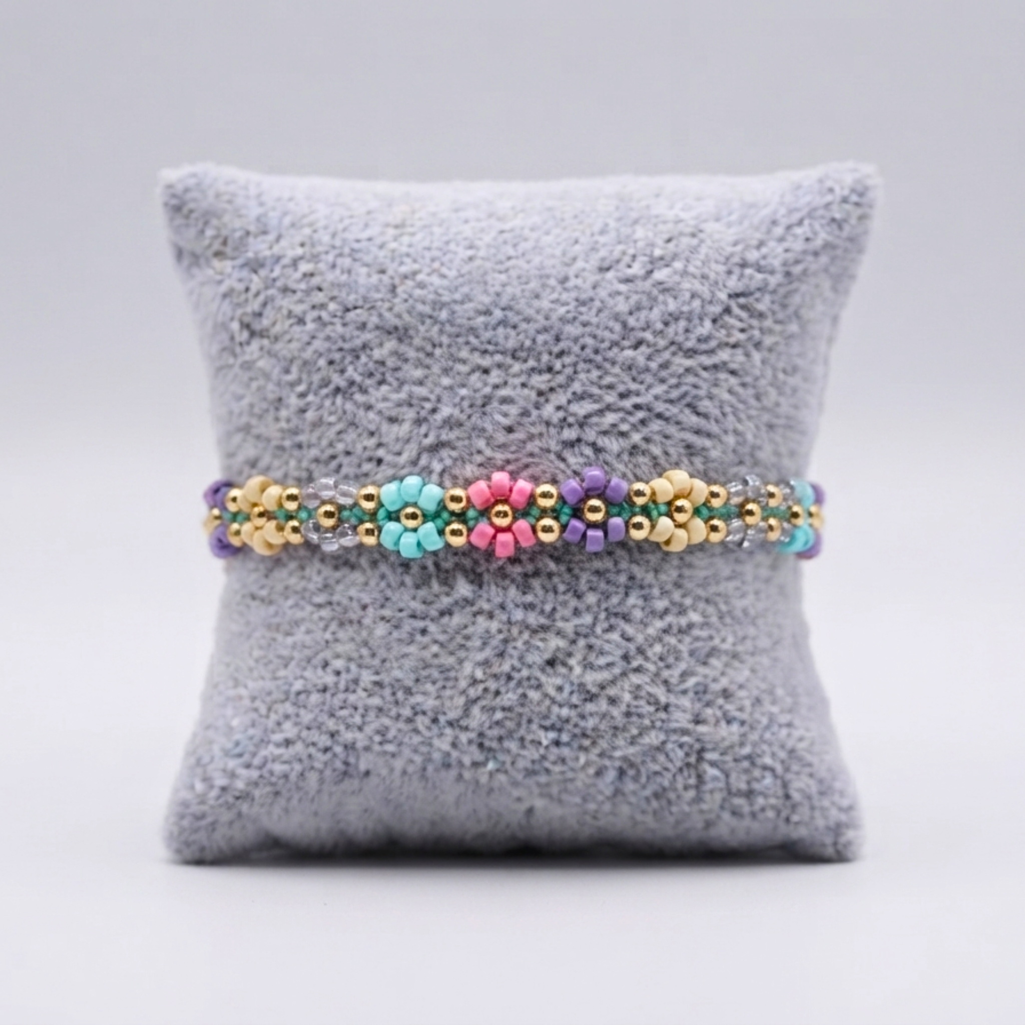 Charmed Meadow Chain – Woven Pastel Flower Seed Bead Pull-String Bracelet⁠